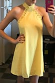 I love the color of this dress and think the back is gorgeous. The only issue is the neck, mine doesn't fit around super tightly, and is loose. I have yet to iron it, the photo is how it came from the bag, but it has a wrinkle so after washing it might be better? It's an alright dress and I can't wait to wear it to Jamaica. (Please pay not attention to my nips as I wasn't wearing a bra) - Kaitlin H.