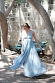 I've bought 3 dresses for my bridesmaids. Amazing quality. Runs true to size. Simple and elegant. The pictures are amazing. My bridesmaids were so comfortable in those dresses!! - Roger K.