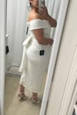 I've been searching for a fitted midi dress with a bow, for my bridal shower, and this one is just what I was looking for. I usually wear 12/14, so I ordered size XL, and it fits like a glove. I was worried about the tummy area, but it's quite forgiving. This is the second dress I have bought from Lulus for my wedding events and cannot recommend the price and quality enough! - Andrea D.