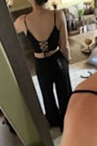I love this but there's some issues with the fit. The top fits well, but the pants are just a little too loose in the waist (I think the next size down would have been too small though) and they're very long (would HAVE to wear pretty high heels so I don't trip over them). I like the idea someone else had of tying a knot at the ankle so I may try that when I wear this out. - Hannah A.