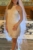 I wore this dress to my bridal shower. Loved the length, and the halter-esque top. I felt it was very flattering on my figure. I'm tempted to make a purchase in other colors. Highly recommend! - Jill K.
