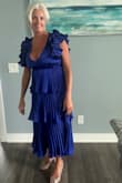 Vivid color and high quality material, this dress looks exceptionally elegant. Wore it to a black tie wedding and received multiple compliments. Super flattering fit, very comfortable to wear. - Beth S.