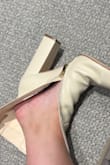 I am a true size 11 and I should have read the reviews - I could not squeeze my feet into these, let alone try to zip them. Fit like a 9! Absolutely no way I can wear them, which is disappointing because they are beautiful in person, lovely texture and soft. But tiny! - Kathryn F.