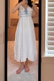I have never considered myself fat until trying to fit in this dress. I couldn't even zip the lower part of it! As a 125lbs person at 5'6, I'll have to return and get a size L! That's ridiculous. - Lynn L.
