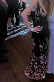 This dress was amazing. The material was soft and airy. The fit was perfect I have never wore a low cute dress this was a first and it will not be the last. I felt sophisticated sexy and classy all in one. The pattern was perfect. Everyone should have this dress - Maureen C.