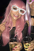 This was the perfect dress if your looking for something fun, cute but a little risque. Great for Vegas or any Bachelorettes. Easy to move and dance in, and the material was super comfortable! 

Please ignore her pink wig as it was for a bachelorette party. The pictures don't do the dress justice at all. - Abby P.