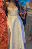 I wore this dress for our wedding after party and it was just perfect. I wore it with a pair of flats and it was so elegant. The pattern on the dress is beautiful and the pockets were so convenient. I don't think this dress would be suitable for a slim build with a bigger bust as there is no stretch in the top part of the dress. - Jude M.