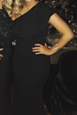 Fits true to size and material is like spandex but didn't feel super tight on. It was really comfortable and I got so many compliments in it. I fell in love with this dress and I loved the one shoulder. Definitely is very flattering on!! I fell in love with this dress!! - Lauren N.