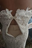 This was my initial review, Im having to edit it because every bride's worst nightmare happened, the dress broke the morning i went to put it on AGAIN. Completely devastated. I had to find something in my closet literally! Luckily this was for our Justice of the Peace wedding as we have a destination wedding next year but still. 

I'd give 5 stars but I'm 5'4 so the dress was just too long. The only complaint I have is the sleeves are so tight fitting, maybe because I'm top heavy so it pulls more up top for me. I did have issues with the zipper mid way and it broke so I had to get a new one sent. Lulus has got to have THE ABSOLUTE BEST CUSTOMER SERVICE, HANDS DOWN!!! I had correspondence and a new dress in the mail within 24 hrs!  

It looks just like the picture. I'm getting it altered for the length which cost me as much as the dress but honestly for the price of this dress it was still a deal!!! Wedding isn't until Aug 9 so I don't have pics to post yet. If you're considering the dress, do it!!! - Lila O.