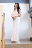 I couldn't have gotten a more perfect dress for my wedding! Everyone fell in love with it! It hugs your body making it look amazing! The back is just perfect! Comfortable and most important is not see through! I would recommend %1000 - Carmen S.