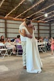 This was my dream wedding dress for so cheap! it was so flattering and i got so many compliments on it! the back was beautiful and the sleeves were perfect! - Mj L.