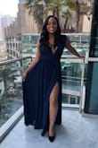I wore this dress during a vacation and received so many compliments! The color, the material, the classy elegant fit...everything looked perfect. There were a few times throughout the night where I found myself tripping over the bottom of my dress because it was a bit long for me but only because I wore flats instead of heels as I originally intended. If you wear heels with this (as the model did), there shouldn't be a problem with tripping over your dress at all! - Akilah F.