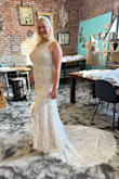 This was the absolute dress of my DREAMS!! I just wish it came in a larger size&. The (very necessary) alterations that I had done to the back, and the cups I had put in made the dress way too tight and I could barely sit down in it. I wish this one had worked out. - Leah H.