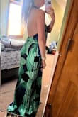 The dress is beautiful only thing is it's very long and I am tall even with heels dress still drags on the floor also the back fall a little higher than it looks on the model - Jennifer B.