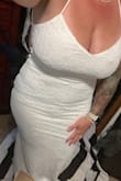 I had been looking for a few months for my wedding dress. I tried on 3 others from this website and this was the most amazing dress for our beach wedding! It is lightweight and so comfortable! The dress has stretch to it and fit perfectly! 2 of the others were a heavier material and would have been nice if it wasn't for the beach/hot weather. I did have it hemmed in the front because I am short and not wearing heels, otherwise the length would have been good. I cant wait to wear it to the wedding! I read so many reviews trying to find a dress and they helped me so much so I hope this helps you too! Buying a wedding dress online was stressful but if you are on the fence about buying this dress for a beach wedding, BUY IT, you wont regret it! - Jacelyn W.