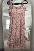 This dress was soo pretty but was too small for me and was on a sale so that I couldn't return [it] and then a larger size was out of stock. The details on this and length were perfect though! - Lauren K.