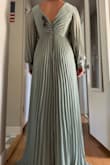 When I tried this dress on it actually made me feel larger than I am. I think the type of dress works for some but it just didn't work for me. Loved the color though. - Jordan K.