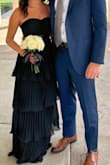 Loved the dress so much, I bought it to be a bridesmaid in a wedding! However, the zipper completely failed the first time I wore it (which was AT the wedding). It was awful, but I had no other choice but to wear it. So, we covered it with a makeshift bow. So upset that the quality was poor for the price and that I will not be able to wear it again. - Cassie C.
