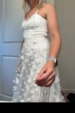 The dress was mailed quickly, and as soon as I opened it I fell in love and I can't wait to wear it in my engagement photos sept 8th! I showed my fiancé a video and he's obsessed and he's waiting impatiently to see me in it on the 8th so we can catch his reaction for the camera! - Kelsie S.