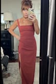 I wore this dress as mother of the groom for my sons wedding and got so many compliments. It was very classy yet I still felt sexy in it. I will say, the rib area was a little tight on me and I wish there was a little more breathing room, literally. I have an athletic build so perhaps that affected the fit. I did have it hemmed and had the shoulders taken up a bit as well. Overall I loved this dress and picked it from about 7 dresses that I ordered for the occasion. - Christina W.