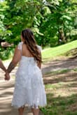 I wore this dress for my engagement party & loved it so much!! The flowers, lace, tulle, and bows were all so beautiful. It was also comfortable. I ordered a large because XL wasn't in stock. It fit my waist and everywhere else, but not my girls. Luckily my fiancé's sister is handy and she easily turned the back into a corset. For reference, I'm normally a 12 or 31 in jeans! - Rachel R.