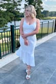 Bought this dress for my engagement party and it fit perfectly! So comfortable and cute. I received many compliments. Would recommended for any bridal event! - Sam B.