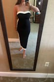 I love the way this dress looks on! The material is really comfortable and the black with white stripes is very slimming. Got this dress for a nice dinner out on vacation, and got lots of compliments, so highly recommend. - Emma B.