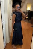 This dress fit me so well. I can wear a small and medium in a lot of things but I'm glad I ordered a small. My midsection requires a tighter fit and this did it. The fabric is nice and soft. The ruffles added a touch of elegance and turned a plain dress into something interesting. - Martha B.