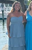 I had ordered a L, but it was a tiny bit tight in the chest so I exchanged it for an XL to be more comfortable and it was PERFECT! I got so many compliments on this and it was so comfy. - Emily M.