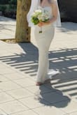 I wore this for my wedding. It was beautiful! I had to get the length shortened but other then that it was perfect. I ended up leaving it on all night. It does not look cheap at all. High quality and very comfortable! I tried on a bunch of their dresses and even went to their store. This was the winner. - Christina S.
