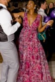 This dress is an absolute showstopper! So beautiful but it is tight around the chest (ordered according to my measurements) and the zipper gets stuck on the band, even when not wearing it. I could not zip it up all the way but luckily my hair was able to cover it. I'm not sure that I would say order up because the chest area may be too loose depending on body type. - Ivorie W.