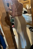 This dress really shows off my butt! Definitely accentuates the curves on the bottom end. The top seems to squish and flatten out my boobs a bit, so I had to add some sticky cups so that my boobs didn't look flat. The material is stretchy and comfortable to wear, and it is not see through (so I'm not worried about bra/underwear showing, which is great). This dress was a little too long for me, but with heels, I'm able to manage. It is just a little hitting the floor while I wear it with heels, but the material is substantial enough that I'm not worried about it. I'm wearing this as my reception dress for my wedding. It's way more comfortable and flattering than the dress I went to a bridal store and paid $1400 for that I'm wearing at my ceremony. - Heather P.