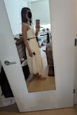 The dress is well made and very pretty. The zippers ok. I'm usually a small, but felt like the XS would've been better. There was room at the waist and bust for me. - Luna C.