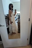 Very pretty dress. Like some others said, the string's material can irritate skin. This dress fits my small bust well. I'm going to sew in my own bra inserts. - Luna C.