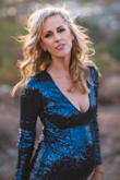 Loved this dress!! Looked like liquid sparkle in the photos!!! Super stretchy so it fit perfectly over my 7 month baby bump!! A little short for me, but it was just for this photo shoot so it was fine. Otherwise perfection. - Lindsey W.