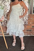 Wore this for my bridal shower and it fit great! Semi fitted up top but loose enough to move around. Was very comfortable! - Lindsay G.