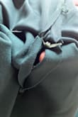 Purchased dress to wear to a wedding. Dress arrived on time. Tried on dress and it has a hole below the zipper. Looks like the stitching wasn't even completed. - Yolanda V.