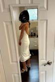 This dress was great for my rehearsal dinner! It was a little tight in the hips. The fabric has no stretch but a medium probably would have been too big as I am small-chested. It was also a little roomy up top-so you may need fashion tape! I got a small - Kaylie F.