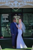 I absolutely loved this dress. I wore it for my wedding!! It has just the right amount of detail with the lace in the back and the buttons, but it was still very simple. It fit me perfectly, and it looked great in my photos. - Isabelle S.