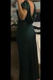I absolutely love this dress! I own both the green and dark teal! Begging them to make in white so I can wear for my wedding events!!

I am a little curvy in the waist and this is not restrictive on me! And fits perfectly to the floor! - Jacquelyn F.