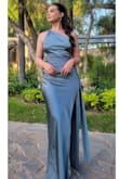 The dress is very beautiful. The color is a little different from the pictures but it is still a nice color. The fabric wrinkles easily. - Stephanie E.