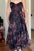 I'm 9 weeks postpartum and have a wedding to go to in a few weeks. Usually would wear a medium but sized up to a large since a lot of the other reviews said to size up, so I ordered a large. The large had a bit of extra room and I knew it was supposed to be a tight bust. There was quite a bit of flatness in the pleats from shipping. I decided to exchange this for a medium and see if that made the dress look better. The medium is the second picture, which fits much better but even more flatness in the pleats from shipping. I reached out to customer service to see how to get the pleats back to how they should be and was basically instructed how to repleat the entire dress from top to bottom. They offered me a refund for the dress which I took because I don't feel like for the price of the dress I should have to repleat the entire dress myself by the time I get it. Customer service was great. The dress just didn't work out for me - MEGAN W.