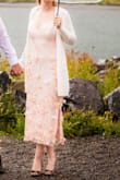 This dress was a great fit for my body.  It was able to show off an complement my curves and was still loose enough to move around in.  I'm typically a size small and got this in a size small, and it fit as I expected.  Wore for an engagement photo shoot, and the photos turned out well.  A few of the flowers have fallen off, but not any more than I would expect with this style of dress. - Heather P.