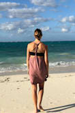 I wear this dress typically as a swimsuit cover up to the beach. Super easy to throw on and go. I've also worn it with a cute bralette and went to lunch a few times. If you are wanting the dress to be more fitted then I would suggest ordering a size smaller than you usually wear. But i wear it loose and it's super comfortable, especially on days it's really hot out. - Nancy E.