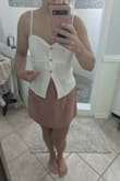 Really cute top. Bit tight around my ribs though and kind of pulls. I'm going to keep it but for photos will have to readjust or hope it stretches a little. - Stephanie M.