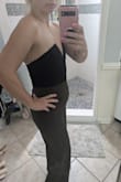 Fits like a glove. I think I'll wear some tape with it. It doesn't have a zipper, just stretches to get it on. I'm 5'2 and it fits me perfectly. I imagine if you were longer in the torso it wouldn't fit. - Stephanie M.