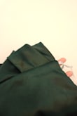 This dress looked perfect! The backless portion and the sheen look was stunning. BUT, the fabric tends to soak in watermarks when steaming. These watermarks look almost black. As someone who is on the shorter side, I had to get this dress tailored so it wouldn't drag on the floor. The tailor steamed the dress since there were some TOUGH wrinkles to get out when I recieved it. Unfortunately, there were black markings that are near impossible to remove even after numerous attempts from the tailor and myself. They would barely lift off the fabric. With some consideration, I decided to give up on the dress rather than alter it to an uncomfortable/less minimalistic version due to time constraints. So perhaps, don't steam this? Be wary of the amount of water you use on this dress. Also, avoid drying this dress with high heat. - Viviana F.