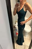This dress was fabulous! The material was fabulous... this dress was extremely well made.... I bought 7 dresses.... and this is the one I chose! The color was beautiful.... and I felt great wearing it! It had a great stretch to it as well... Fit like a glove..... - Rebecca B.