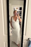 I am 7 1/2 months pregnant and this dress is perfect for my elopement. I know it's not listed as a maternity, but I looked at the reviews and was pleased with my purchase. The fabric has just enough stretch for my belly! - Gabriela M.