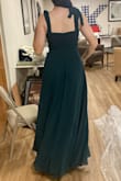 Really cute flowy dress, for my bust size it does a really good job of keeping everything together and the fabric is thick enough to not need a bra. It is tight with no stretch so if you have a bigger bust than a C I would size up. Fabric on the outside is a little scratchy but still nice. Fabric on the inside is smooth and satiny. The waist is great (I'm snatched in this, hides stomach really well). I'm 5'9 and it's almost floor length even with heels so if you're shorter you WILL need to get it shortened (wearing heels in the picture). Wearing this for sorority recruitment and it's perfect if you need something more modest but still very elegant. - Adrian D.